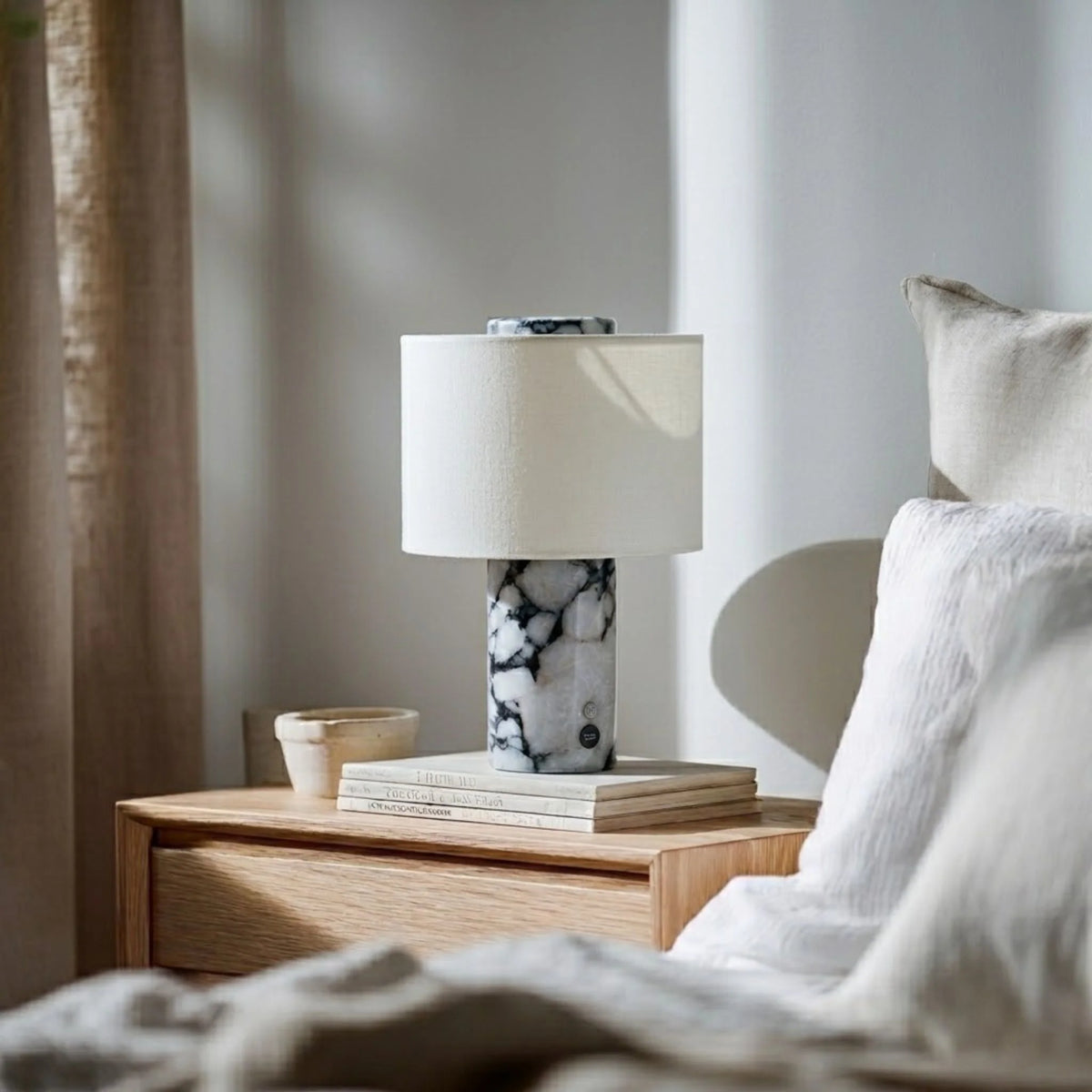 Rechargeable Mira Table Lamp with a stylish marble base, designed for cordless convenience and modern elegance. 1