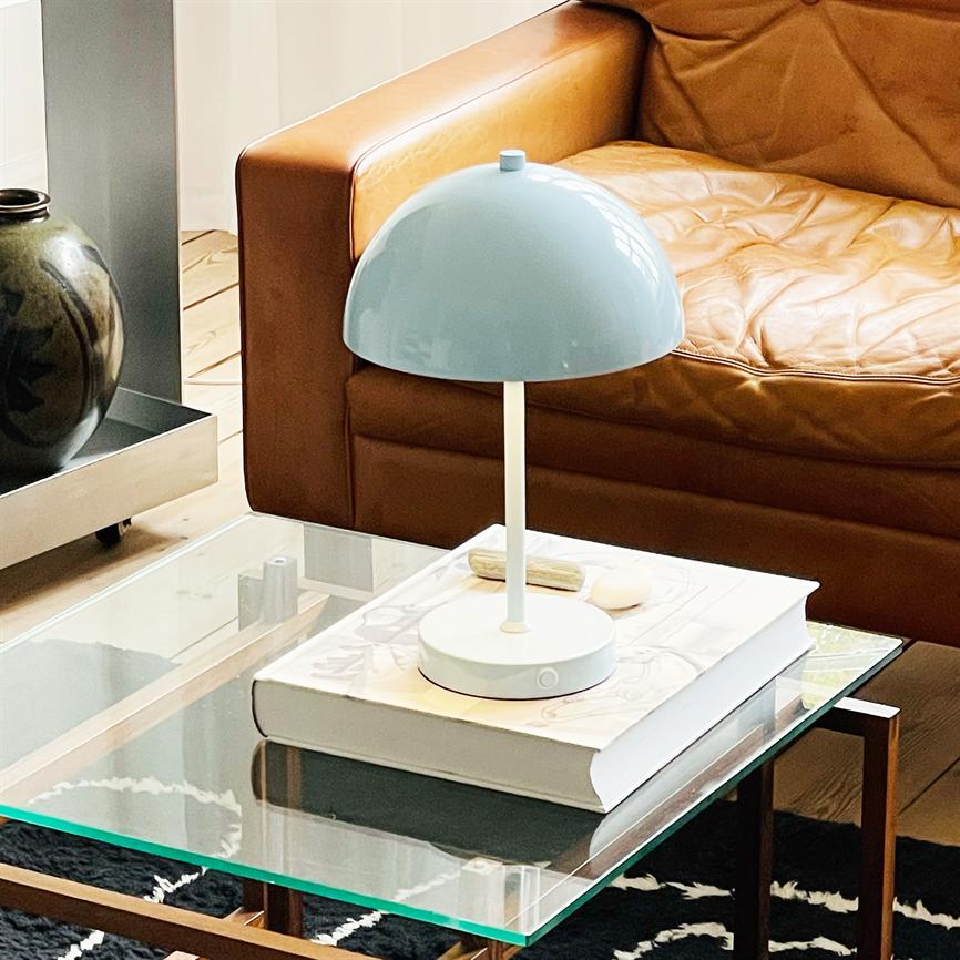 Solea LED Table Lamp featuring a sleek design, rechargeable cordless functionality, and adjustable brightness settings for versatile lighting solutions. 2