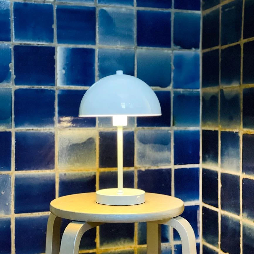 Solea LED Table Lamp featuring a sleek design, rechargeable cordless functionality, and adjustable brightness settings for versatile lighting solutions. 3