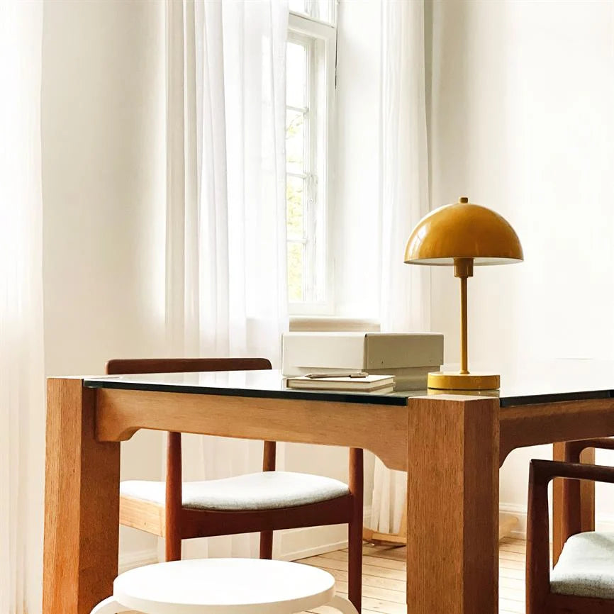 Soren Table Lamp in warm curry color, featuring a rechargeable cordless design and adjustable brightness settings, perfect for adding ambient lighting to any space. 1