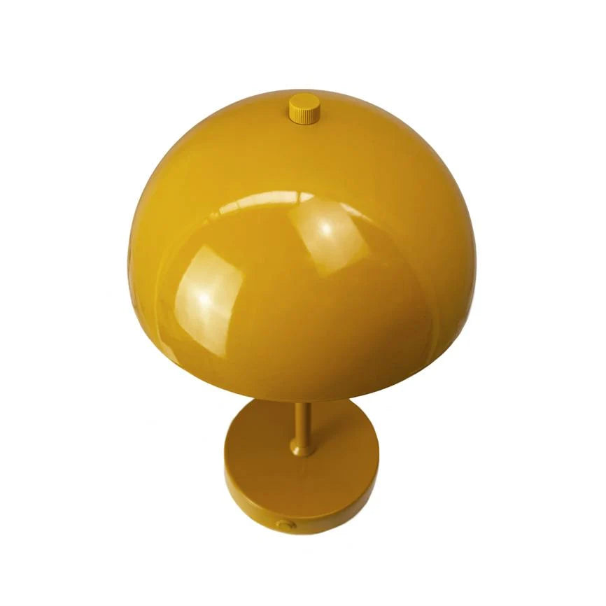 Soren Table Lamp in warm curry color, featuring a rechargeable cordless design and adjustable brightness settings, perfect for adding ambient lighting to any space. 4
